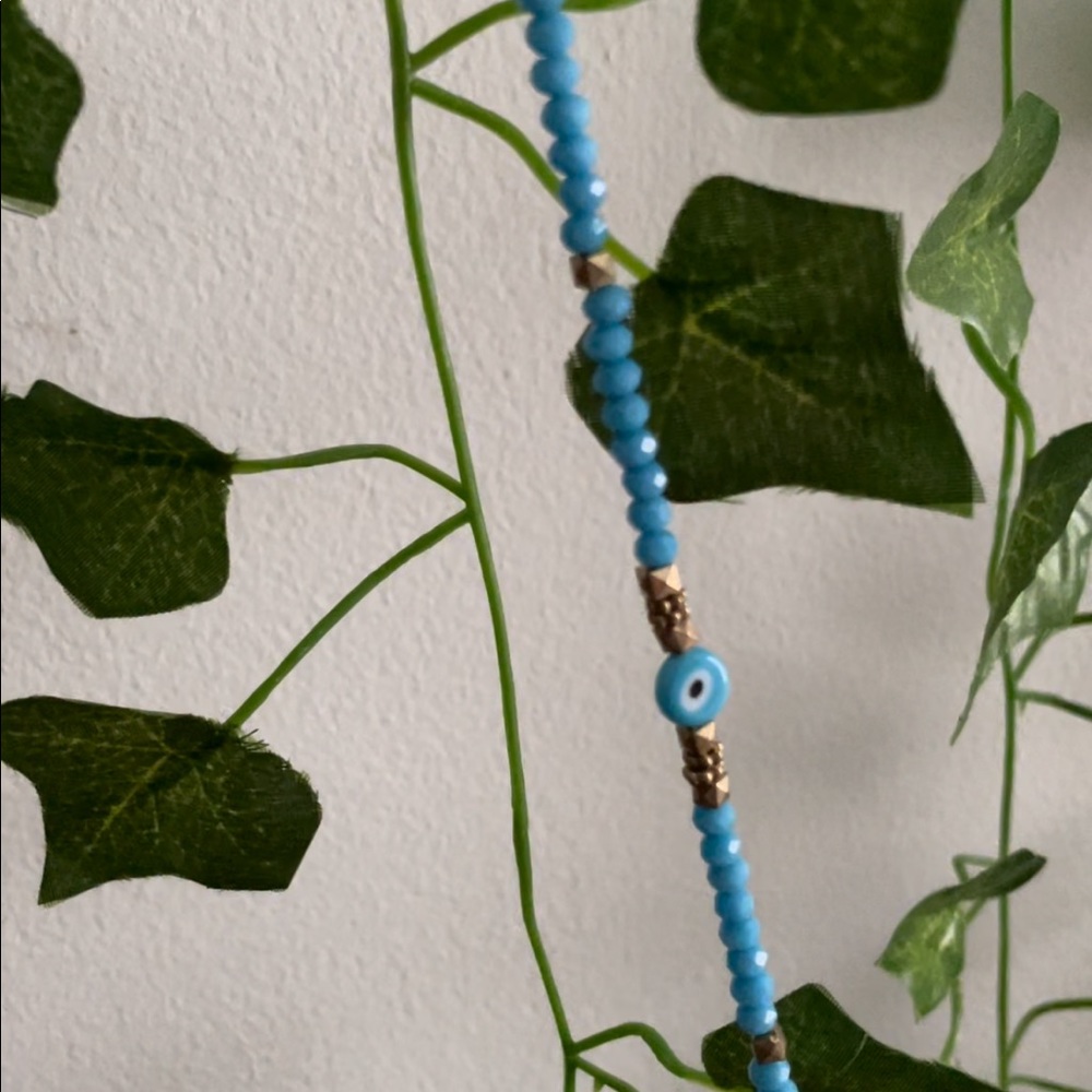 blue evil eye bracelet.